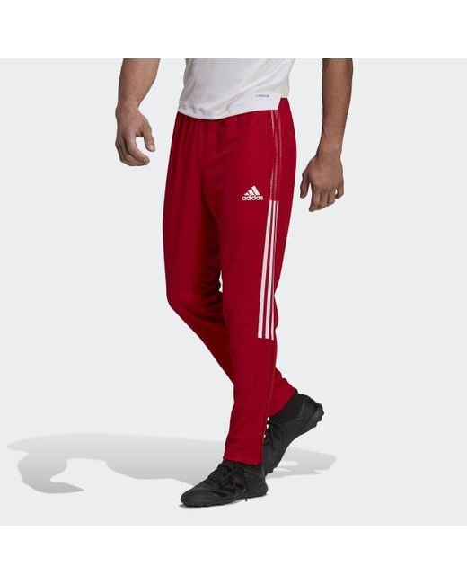 red tiro pants