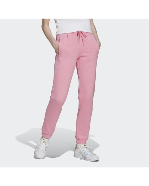 Pantaloni adicolor Essentials Fleece Slim Joggers di adidas in Rosa | Lyst