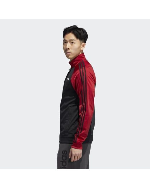 black adidas track jacket with red stripes