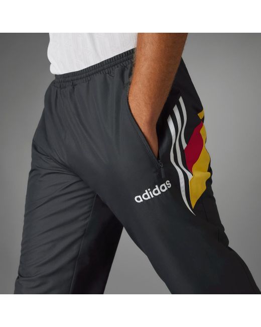 Pantaloni da allenamento 1996 Woven Germany di Adidas in Gray