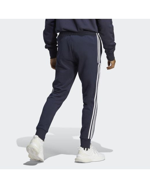 Adidas Blue Essentials French Terry Tapered Cuff 3-stripes Joggers for men