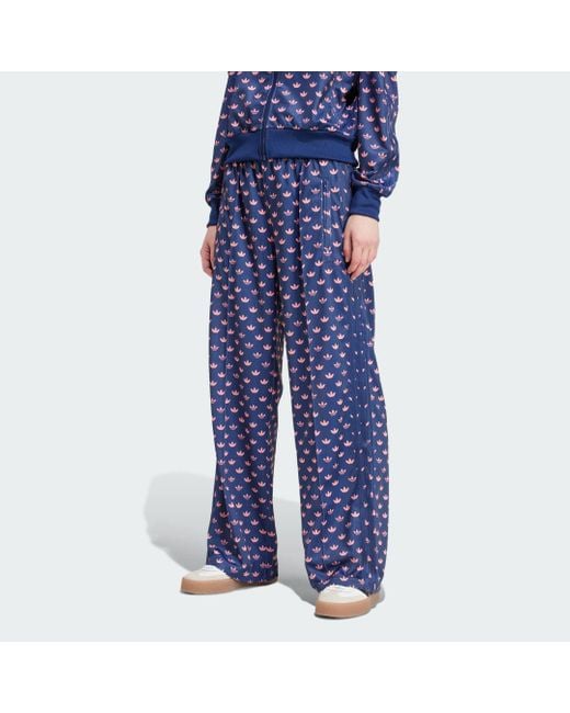 Track Pants Monogram Firebird di Adidas in Blue