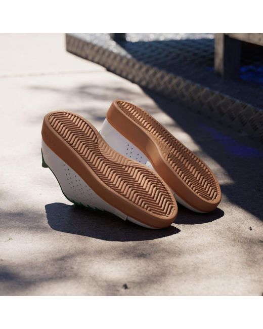 Adidas advantage brown deals