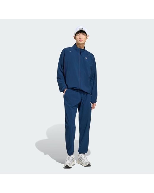 Adidas Blue Tech Trefoil Essentials Track Pant for men