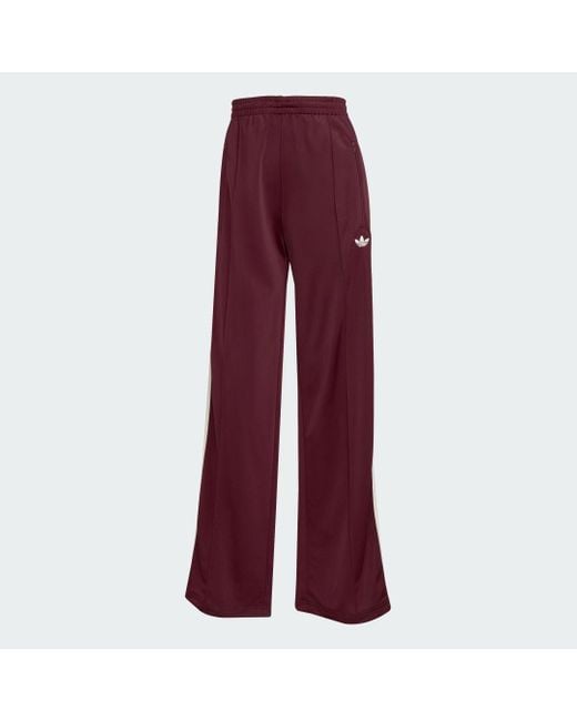 Track Pants Adicolor Classic Firebird Loose di Adidas in Red