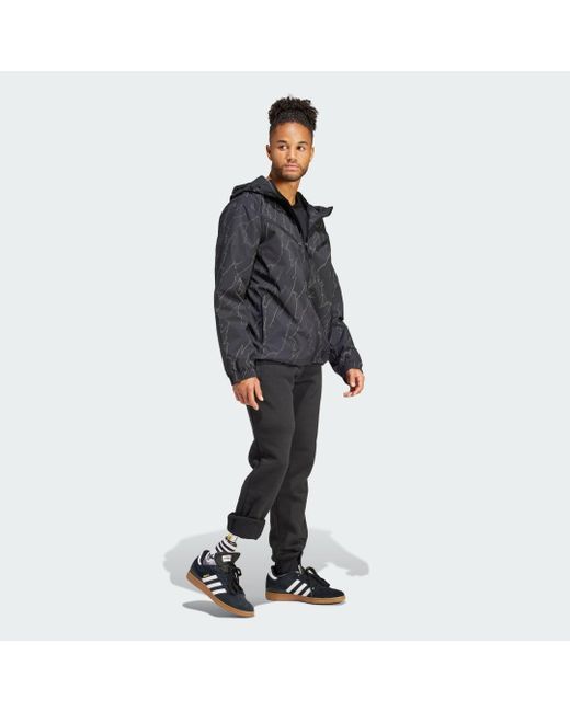 Giacca a vento Montreal Allover Print di Adidas in Gray da Uomo