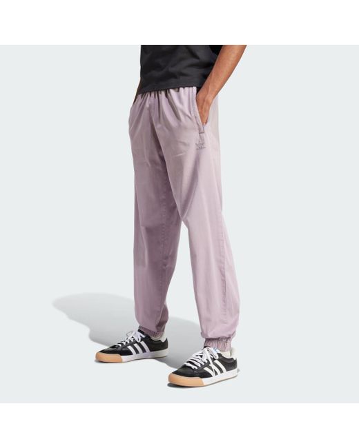 Adidas Purple Trefoil Essentials+ Dye Woven Trousers for men
