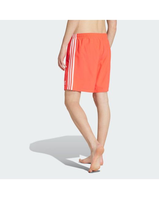 Shorts Da Nuoto Adicolor 3-Stripes Da 8 Pollici di Adidas in Red da Uomo