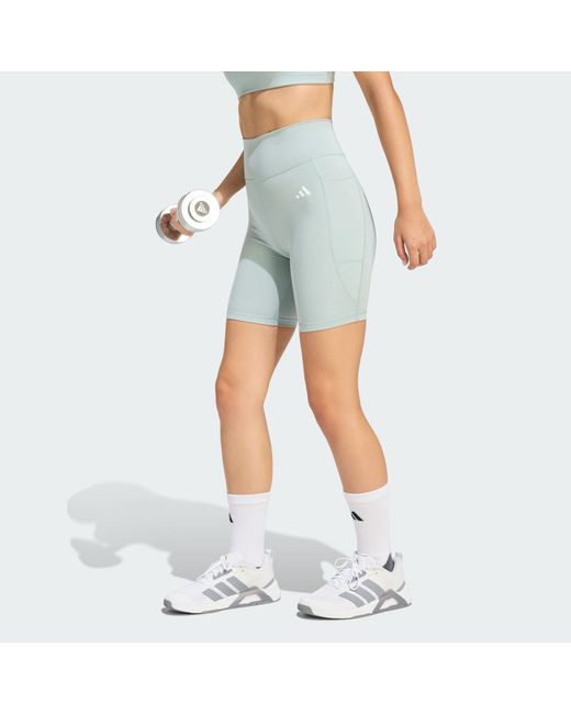 Adidas Blue Optimé Essentials Stash Pocket 7-Inch Short Leggings