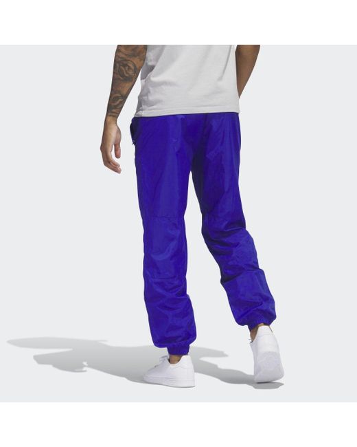 Adidas Purple Premium Essentials Crinkle Nylon Tracksuit Bottoms for men