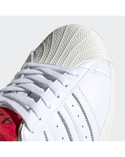 adidas white shell toe shoes