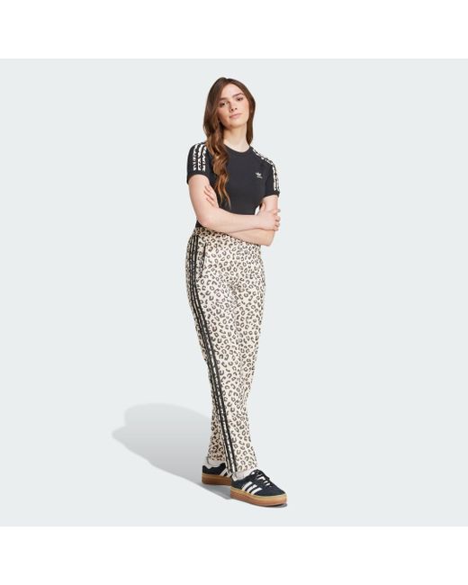 Pantalón Firebird Leopard Adidas de color Black