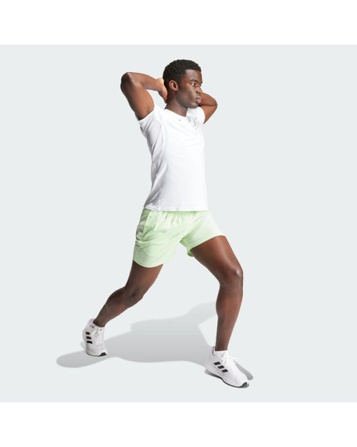 Short Own The Run di Adidas in Green da Uomo