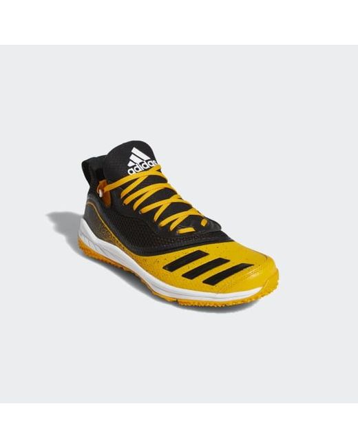 yellow turf shoes