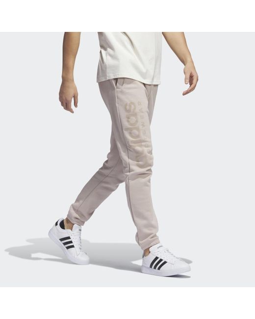 Pantaloni Lounge Fleece di Adidas in Gray da Uomo