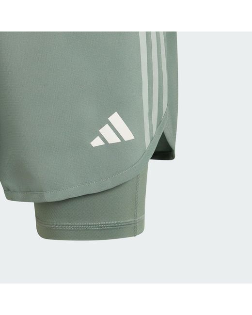 Adidas Originals Green Own The Run 3-Stripes 2-In-1 Shorts for men