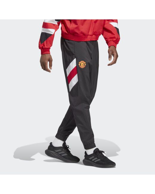 Adidas Red Manchester United Icon Woven Tracksuit Bottoms for men