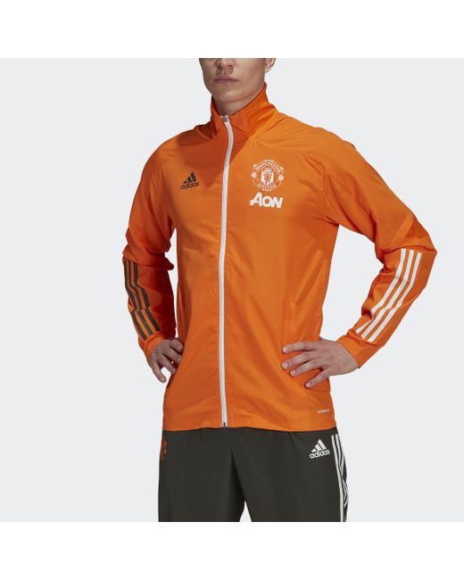 Veste de présentation Manchester United adidas pour homme en coloris Orange  | Lyst