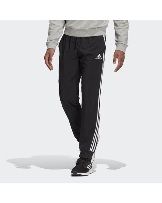 Adidas AEROREADY Essentials Tapered Cuff Woven 3-Streifen Hose in Black für Herren