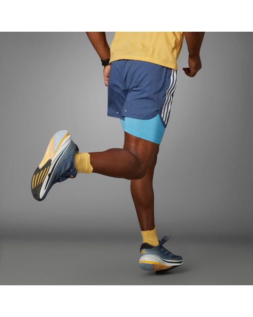 Short Own The Run 3-Stripes 2-in-1 di Adidas in Blue da Uomo