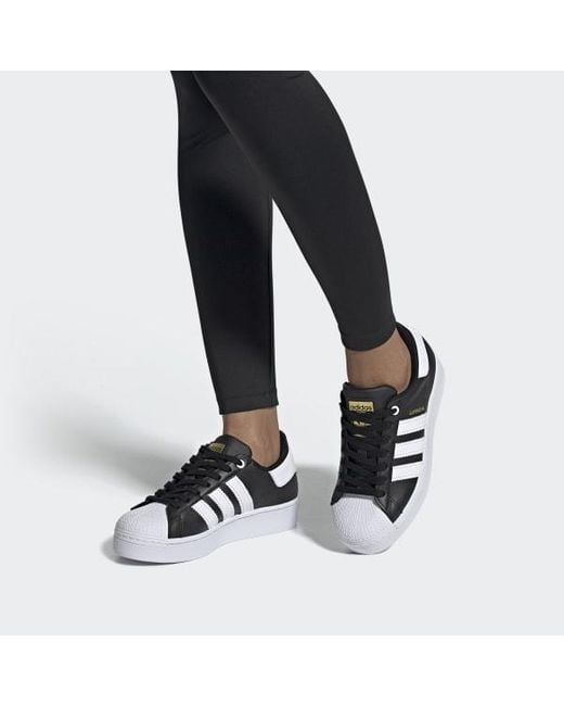 adidas superstar black and gold womens