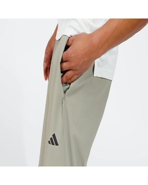 Pantaloni Designed for Training adistrong Workout di Adidas in Natural da Uomo