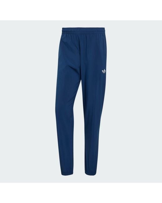 Adidas Blue Tech Trefoil Essentials Track Pant for men