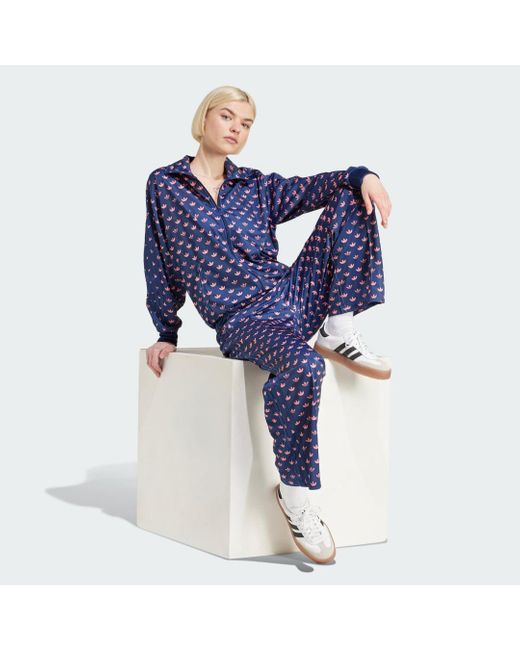 Track Pants Monogram Firebird di Adidas in Blue