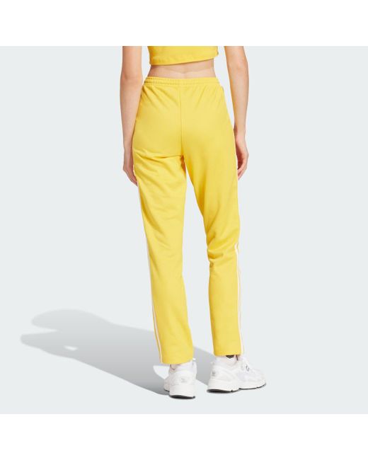 Track pants Montreal di Adidas in Yellow