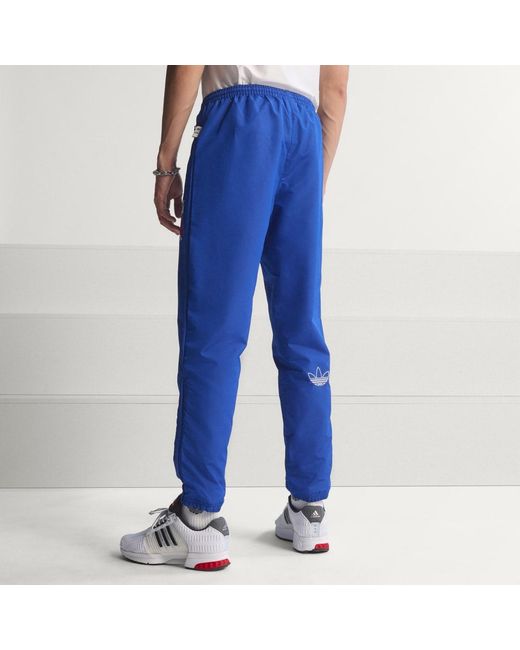 Adidas Blue Graphic Woven Track Pants for men