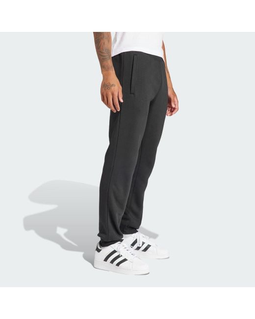 Pantaloni Trefoil Essentials di Adidas in Black da Uomo