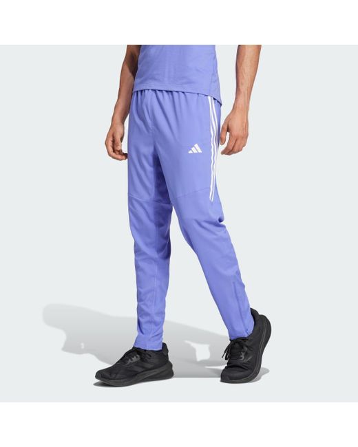 Pantaloni Own The Run 3-Stripes di Adidas in Blue da Uomo