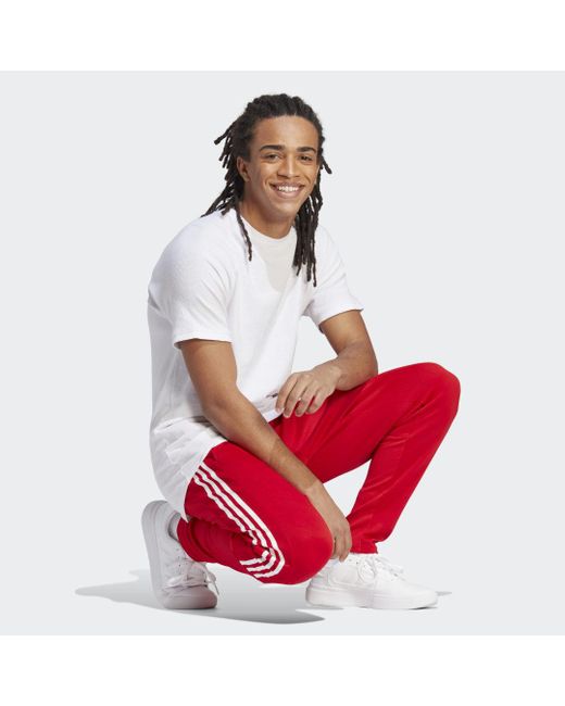 Tiro Suit-up Lifestyle Joggers di Adidas in Red da Uomo