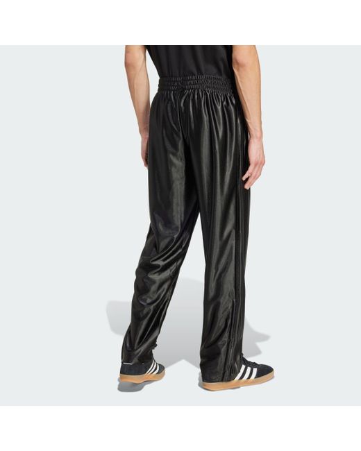 Pantaloni Da Allenamento Firebird Adicolor Metallici di Adidas in Black da Uomo