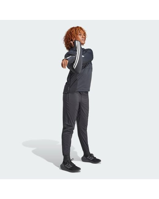 Pantaloni Own the Run di Adidas Originals in Gray