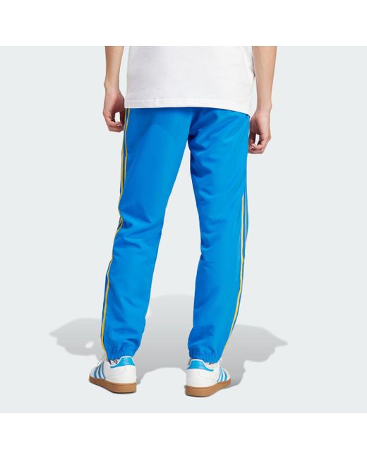 Adidas Originals Blue Woven Track Pants for men
