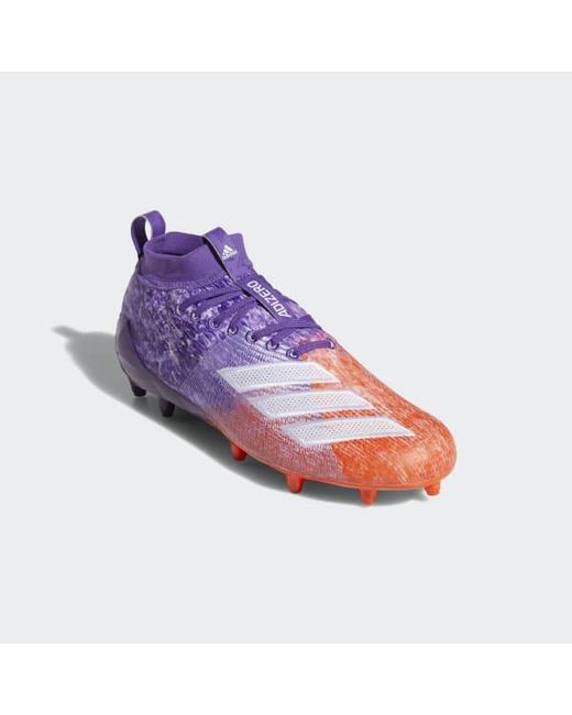 purple and orange cleats
