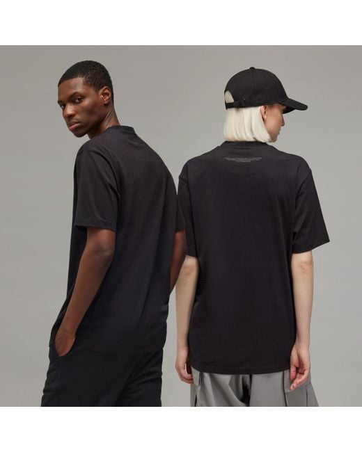 Black adidas shirt with black logo online