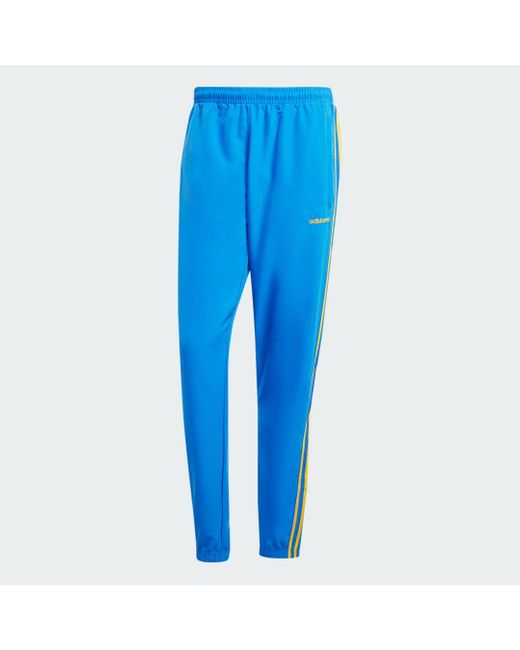 Adidas Originals Blue Woven Track Pants for men