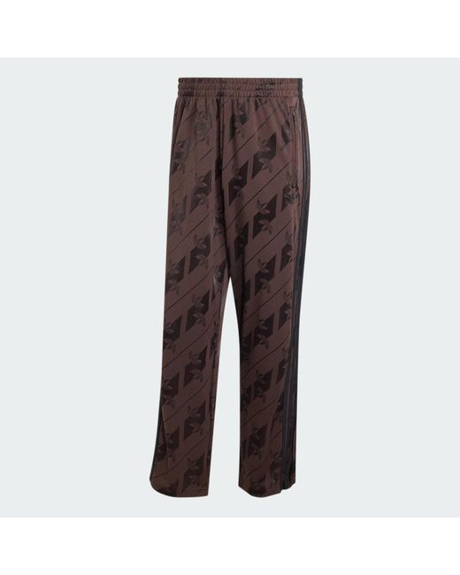 Adidas Brown Monogram Firebird Track Pants for men
