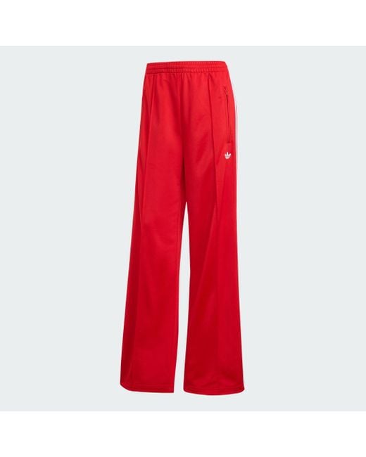Track Pants Adicolor Classic Firebird Loose di Adidas in Red