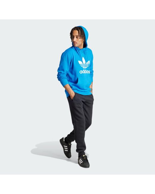 Hoodie adicolor Classics Trefoil di Adidas in Blue da Uomo