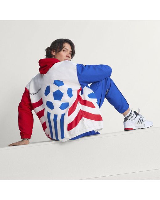 Adidas Blue Graphic Woven Track Top for men