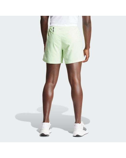 Short Own The Run di Adidas in Green da Uomo