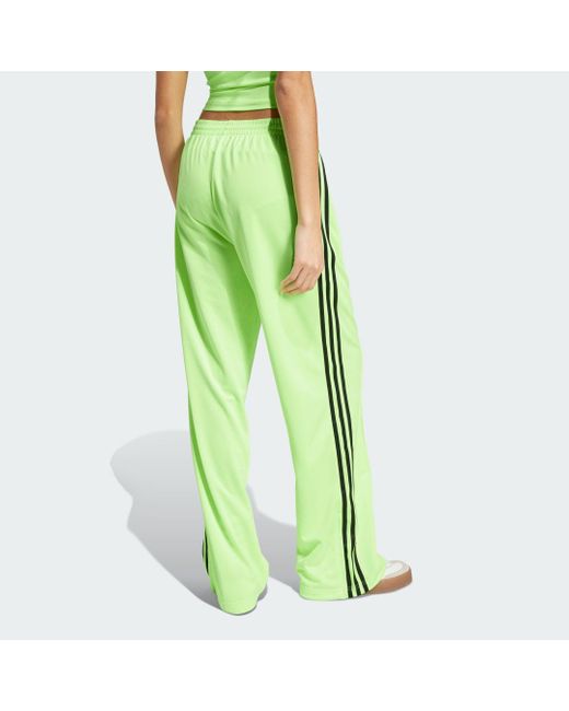 Pantalón Adicolor Classic Firebird Loose Adidas de color Green