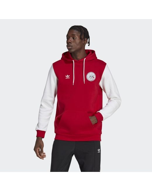 adidas Ajax Amsterdam Essentials Trefoil Hoodie in Red for Men | Lyst UK