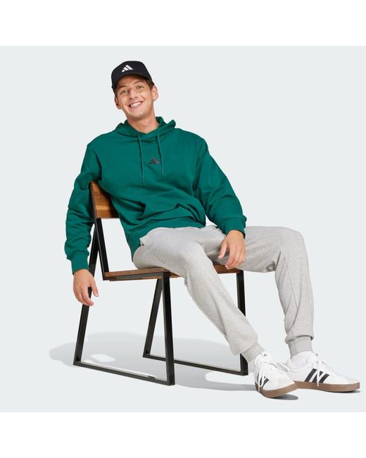Adidas Green Essentials Feelcozy French Terry Hoodie for men