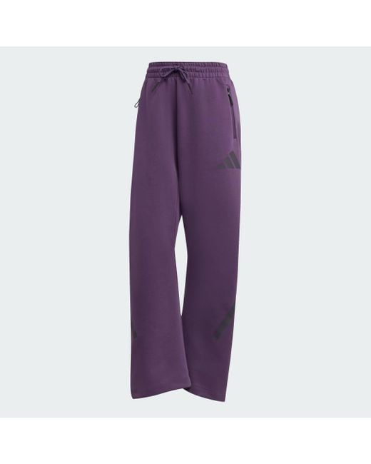 Pantaloni Z.N.E. Barrel di Adidas in Purple