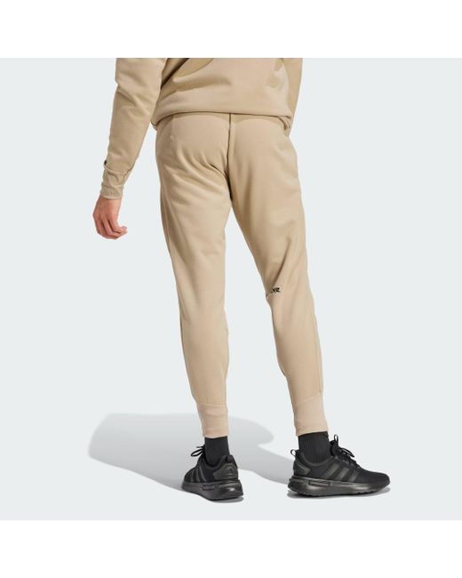 Pantaloni Z.N.E. Winterized di Adidas in Natural da Uomo