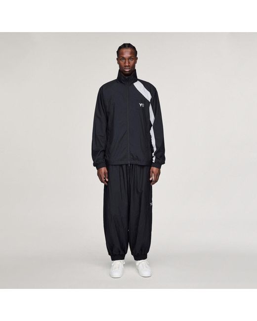 Adidas Blue Y-3 Raw Edge 3 Stripes Nylon Shell Tracksuit Bottoms for men